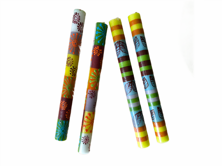 Magic Garden 9" dinner tapers. Hand painted in fun 'garden colors' with leaf, flowers and stripes.  Fair Trade home decor.