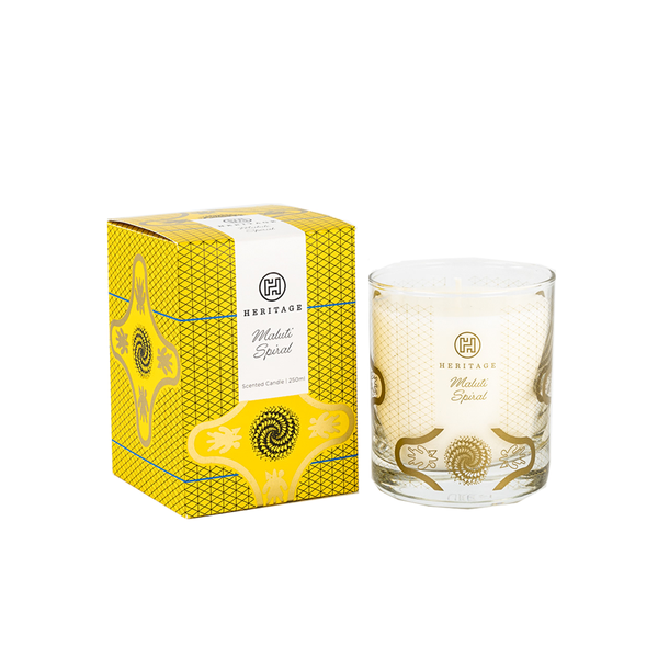 Maluti Spiral 250ml scented candle and gift box. The yellow & black design on the box and glass jar of the candle  is inspired by the spiral aloe found in Lesotho. 