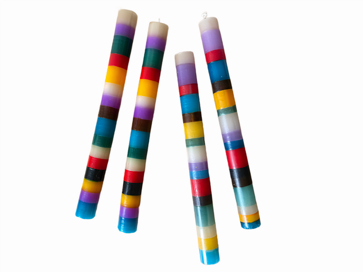 Memphis Stripe 9" dinner tapers. Striped with yellow, turquoise, red, purple and brown. Very fun!  Fair Trade. 