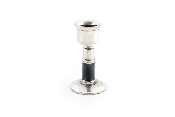Hand made pewter taper candle holder that stands 3" high with a black band at the base. Fair trade products.