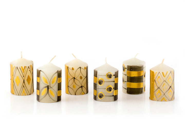 Votive candle selection in the Celebration candle collection. Black & Gold, dots, stripes and patterns.Fun & elegant. Come is a gift pack of 6 votives with story card.