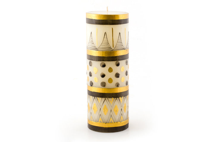 Celebration Candle Collection 3X8 pillar that is handpainted in Black & Gold dots, stripes, and diamonds patterns. . Burn 100 hours.