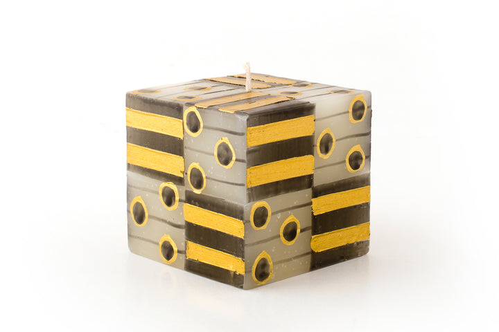 Black & gold designs hand painted on this Celebration Candle Collection 3x3x3 candle cube. Fair trade home decor.