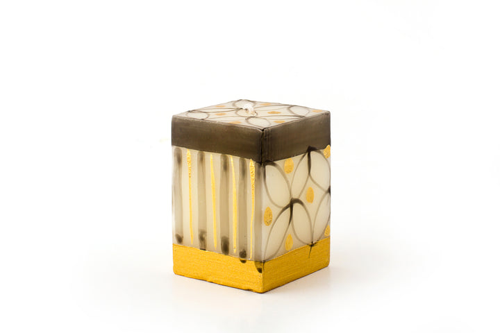 2x2x3 Candle Cube with a black & gold pattern & stripes- stunning design. The collection is called Celebration - that is what it is!  Hand poured and hand painted in South Africa.  Fair Trade home decor.