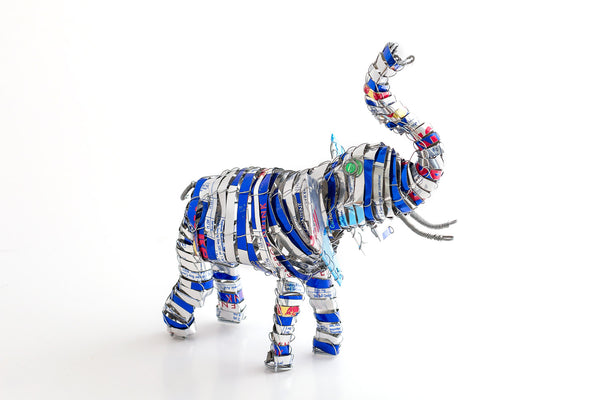 Recycled tin cans of Red Bull are used to make these fun elephants with trunk up for Good Luck!  8" tall.
