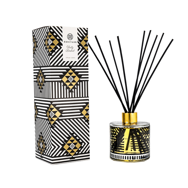 The Unity Basket 200ml room diffuser and gift box. The box is in a 'basket design' that is the symbol of a tightly woven marriage and family.  The glass bottle has the same pattern in black, with black reeds. Stunning!