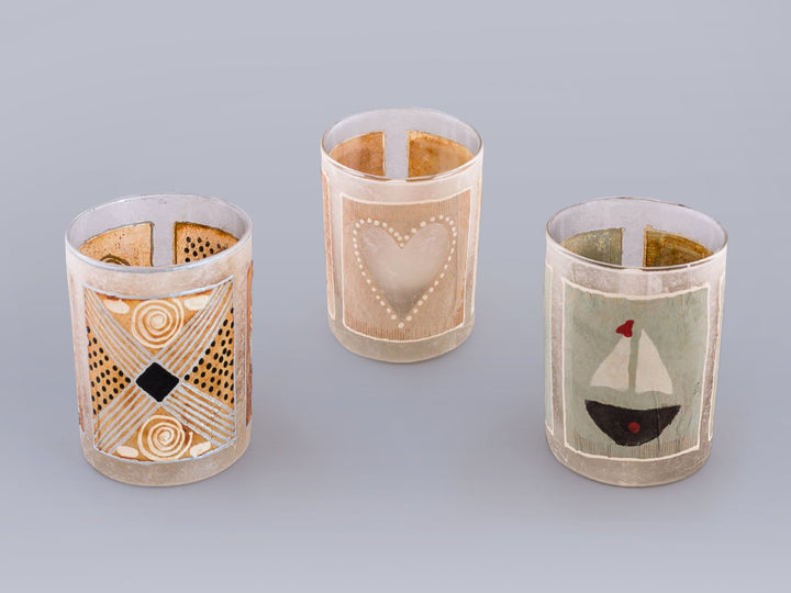 Tea light candles hand crafted using  painted recycled teabags to make the designs. Fair trade home decor.