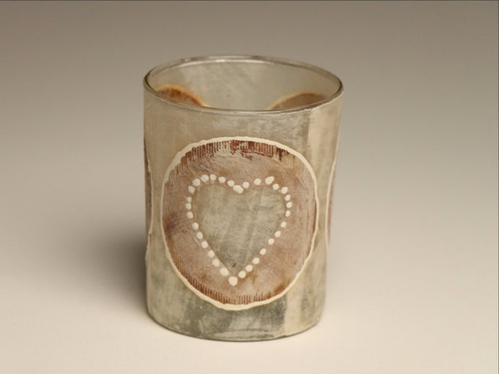 Tea light candles hand crafted using heart painted recycled teabags to make the designs. Fair trade home decor.